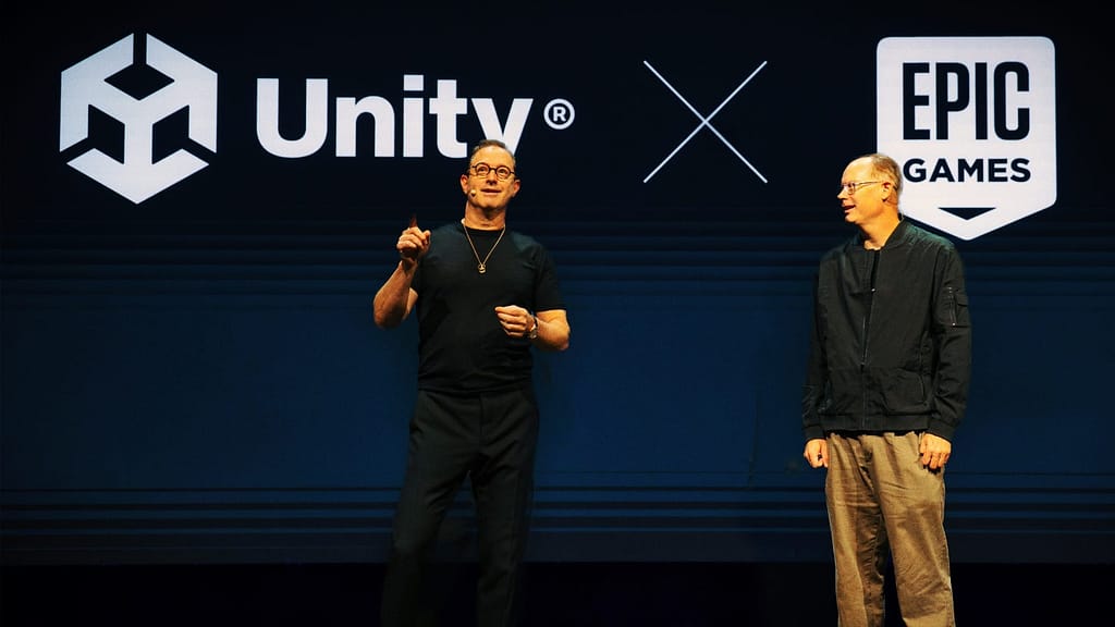 Unity & Epic Games Partnership: What Does This Historic Collaboration Mean for Game Development? 2 Unity and Epic Games executives announcing historic partnership at Unite 2025 conference with company logos collaboration